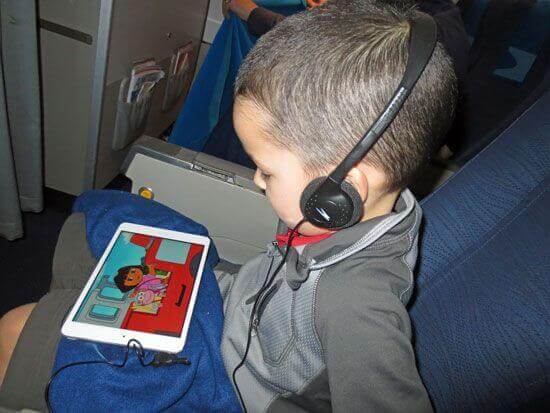 caden-watching-dora-on-airplane